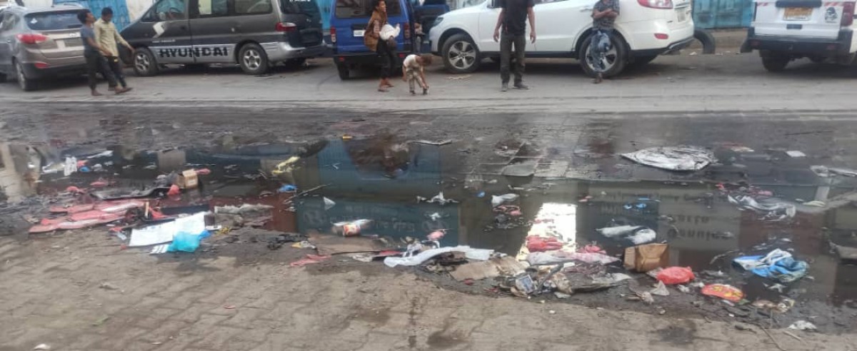 Sewage floods the most important commercial and industrial street in Sheikh Othman