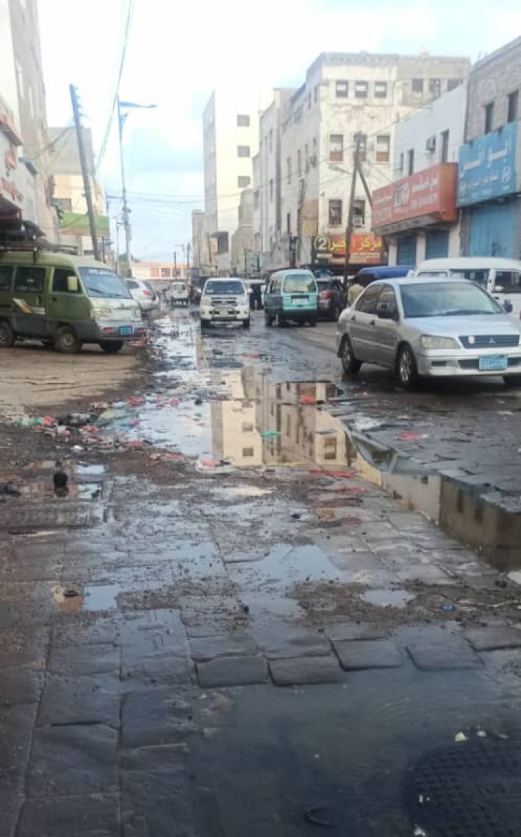 Sewage floods the most important commercial and industrial street in Sheikh Othman