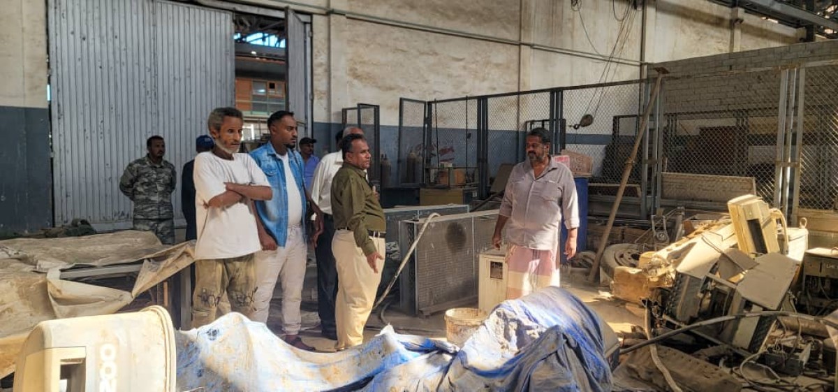 The head of the Gulf of Aden Fisheries Authority inspects the central technical workshop in the fishing port in the capital, Aden