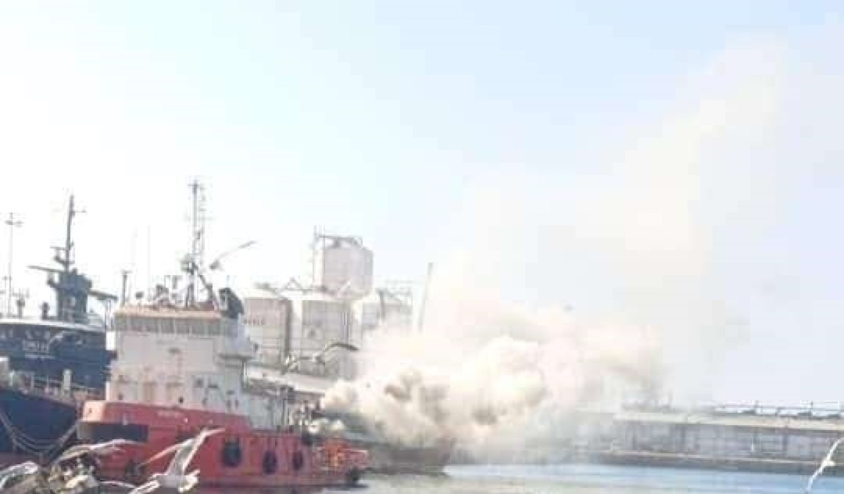 An official committee is investigating the burning of a cargo ship in the port of Mukalla