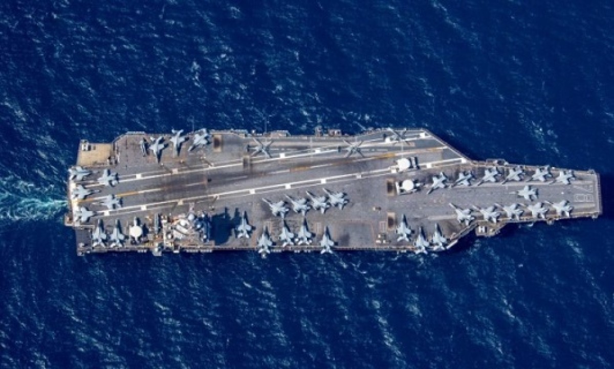 An American aircraft carrier and its attack group are camped off Hodeidah