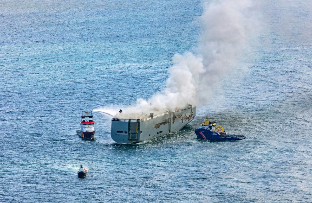 A fire broke out in a commercial ship off Aden as a result of it being hit by a missile