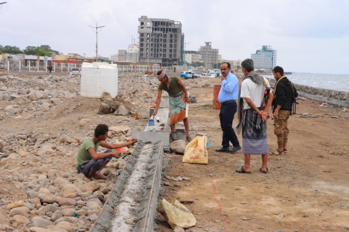 Removing concrete barriers from Airport Road in Khor Maksar after years of closure