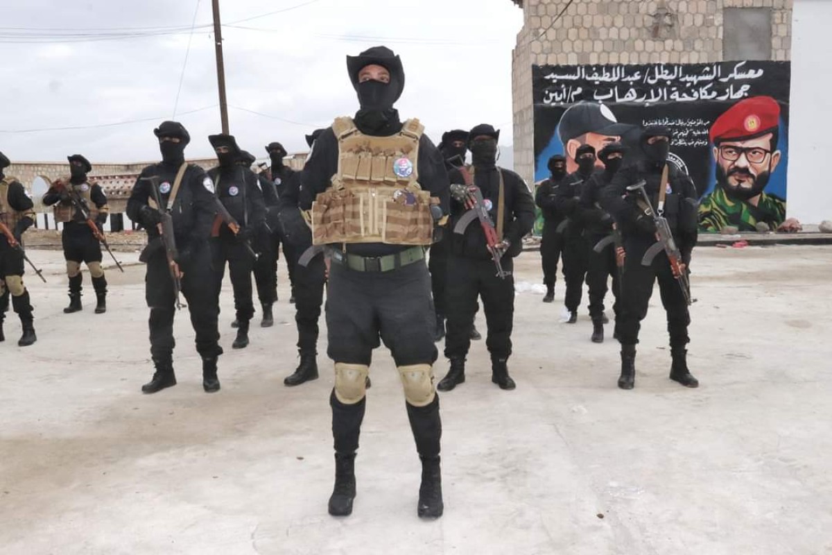 With a solemn display...a new anti-terrorism battalion graduates in Abyan