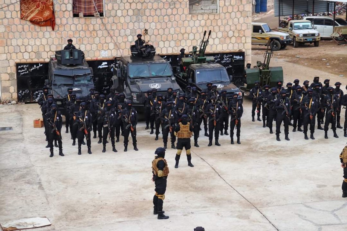 With a solemn display...a new anti-terrorism battalion graduates in Abyan