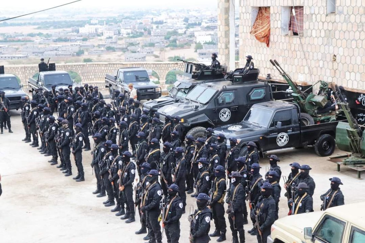 With a solemn display...a new anti-terrorism battalion graduates in Abyan