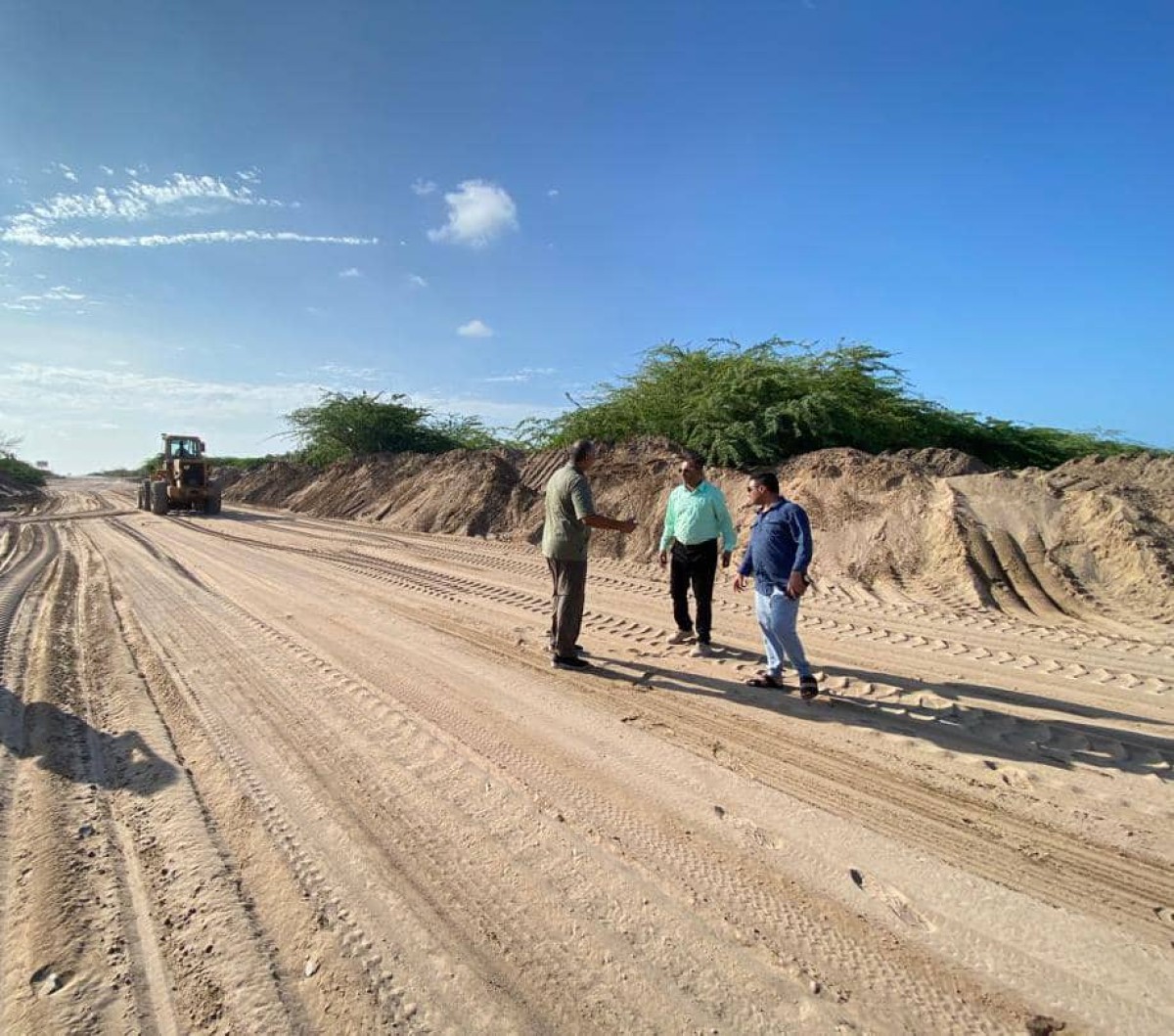 Engineer Moeen Al-Mas reviews the work of removing flood debris from the international coastline of Aden Hadhramaut