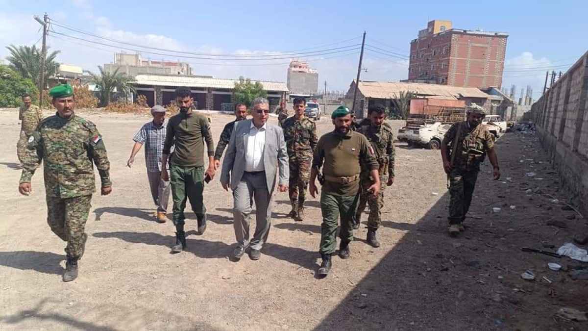 An aide praises the role of the security belt in Buraiqa District